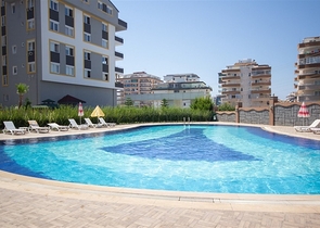 Квартира 1+1 в районе Махмутлар 