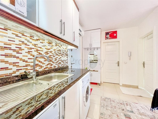 Апартаменты 1+1 в районе Махмутлар