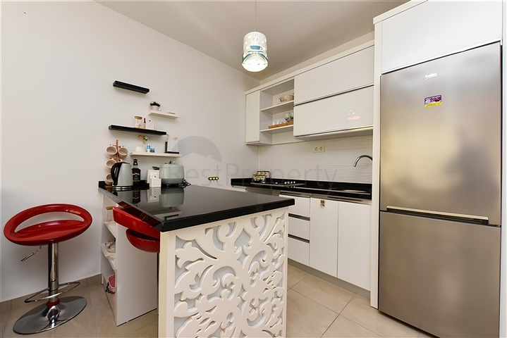 Меблированная квартира планировкой 2+1 в районе Махмутлар