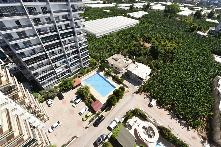 Меблированный пентхаус 4+1 с видом на море в Махмутларе