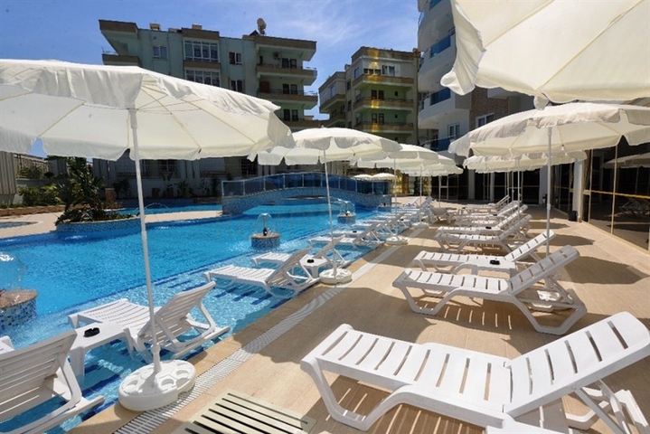 Меблированный пентхаус 4+1 с видом на море в Махмутларе