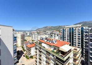 Меблированный пентхаус 4+1 с видом на море в Махмутларе