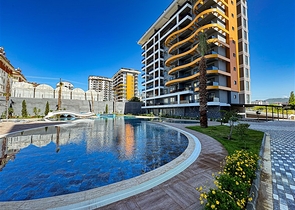 Трехкомнатная квартира в районе с лучшим песчаным пляжем в Авсалларе