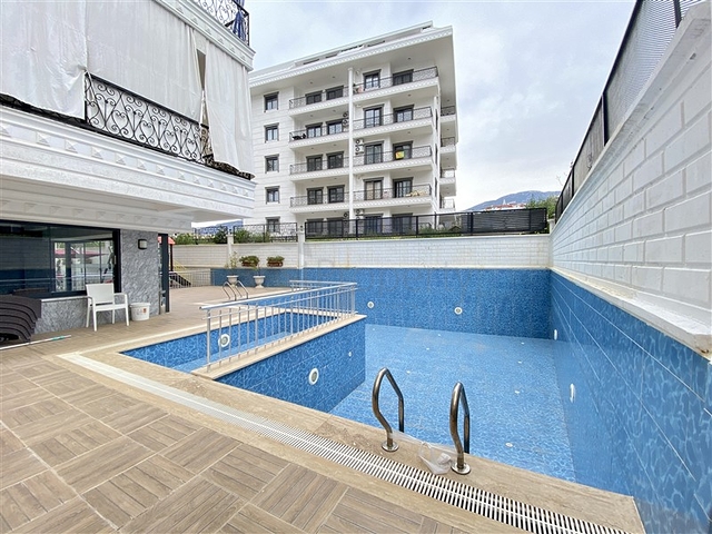 Меблированная квартира планировкой 1+1 в районе Алании, Махмутлар