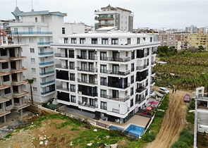 Меблированная квартира планировкой 1+1 в районе Алании, Махмутлар