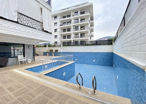 Меблированная квартира планировкой 1+1 в районе Алании, Махмутлар