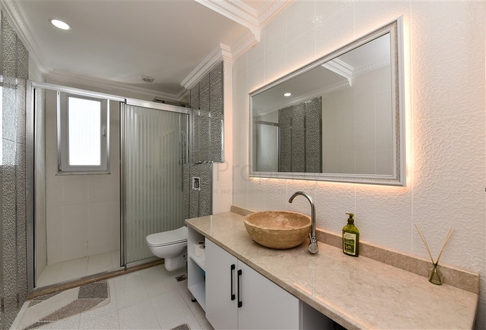 Красивая квартира в резиденции у моря в районе Махмутлар.