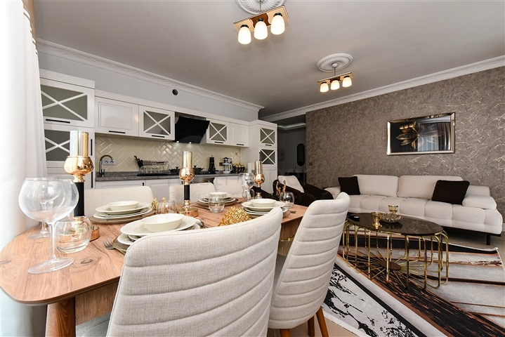 Красивая квартира в резиденции у моря в районе Махмутлар.