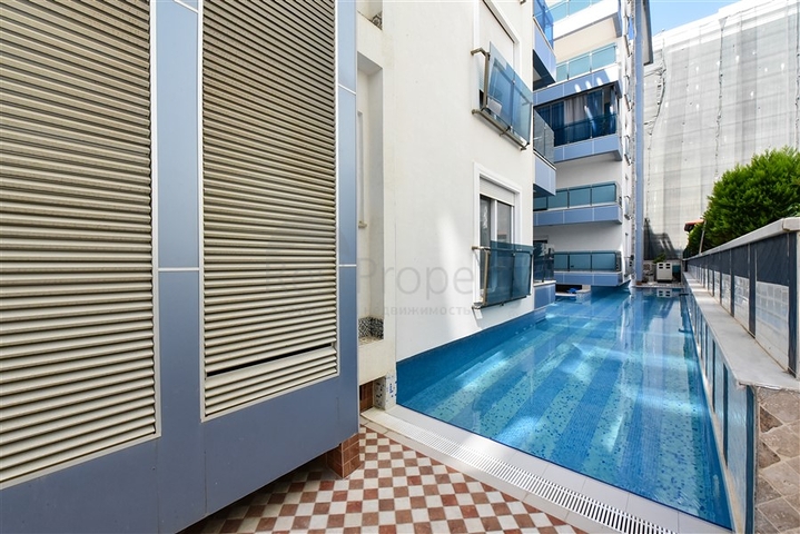 Красивая квартира в резиденции у моря в районе Махмутлар.