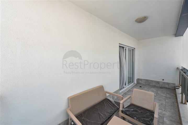 Красивая квартира в резиденции у моря в районе Махмутлар.