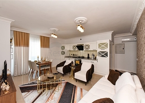 Красивая квартира в резиденции у моря в районе Махмутлар.