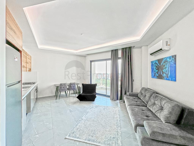 Меблированная квартира 1+1 в районе Махмутлар