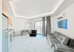 Меблированная квартира 1+1 в районе Махмутлар