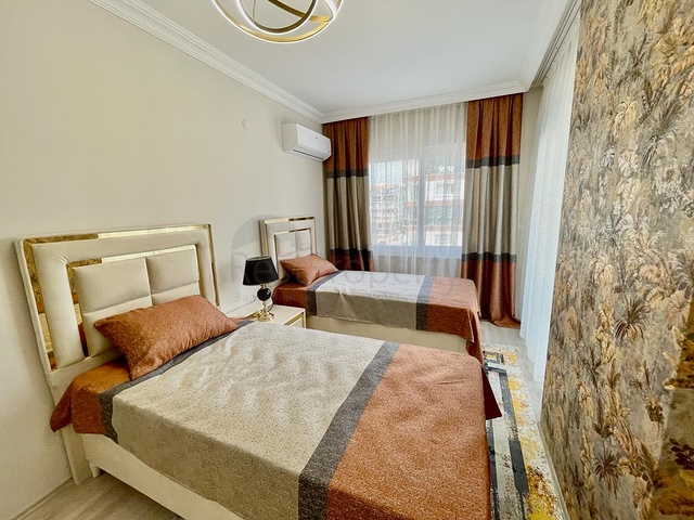 Меблированная квартира 2+1 с отдельной кухней в районе Махмутлар