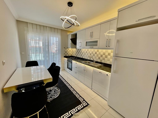 Меблированная квартира 2+1 с отдельной кухней в районе Махмутлар