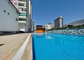 Меблированная квартира 2+1 с отдельной кухней в районе Махмутлар