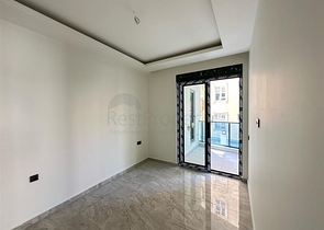 Квартира 1+1 в новом комплексе в центре Алании