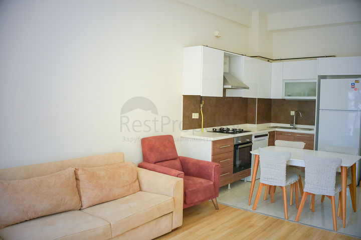 квартира 1+1  в ЖК в районе Бахчешехир