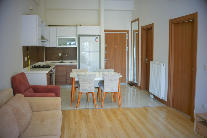 квартира 1+1  в ЖК в районе Бахчешехир