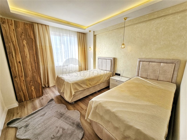 Просторная квартира 4+1 с современным дизайном в районе Махмутлар