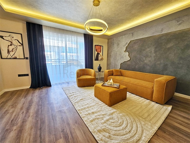 Просторная квартира 4+1 с современным дизайном в районе Махмутлар