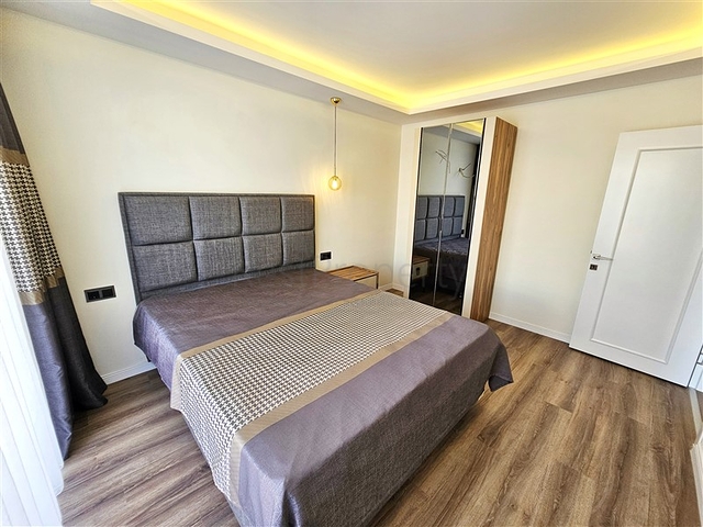 Просторная квартира 4+1 с современным дизайном в районе Махмутлар