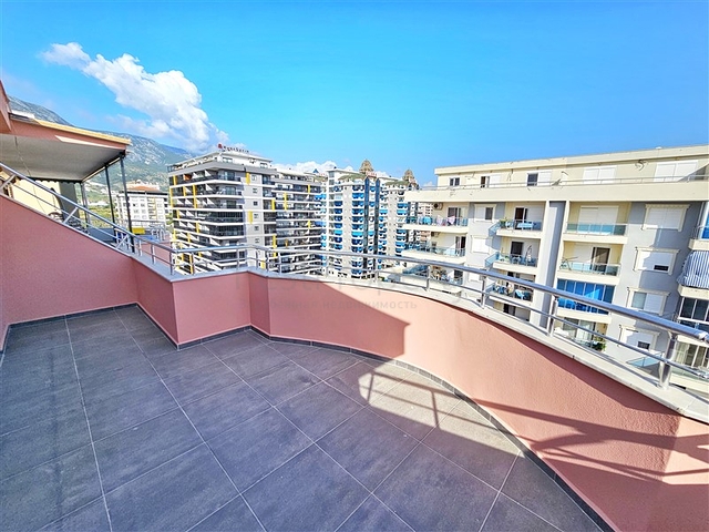 Просторная квартира 4+1 с современным дизайном в районе Махмутлар