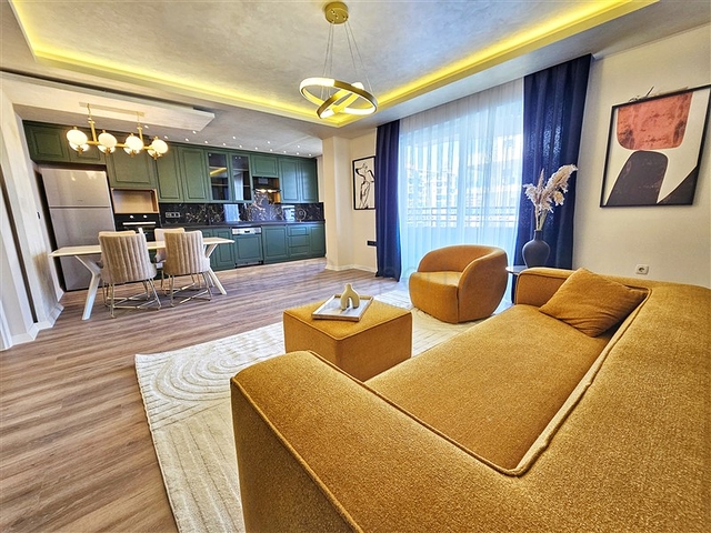 Просторная квартира 4+1 с современным дизайном в районе Махмутлар