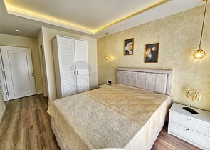 Просторная квартира 4+1 с современным дизайном в районе Махмутлар