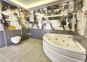 Просторная квартира 4+1 с современным дизайном в районе Махмутлар