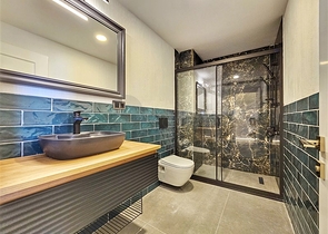 Просторная квартира 4+1 с современным дизайном в районе Махмутлар