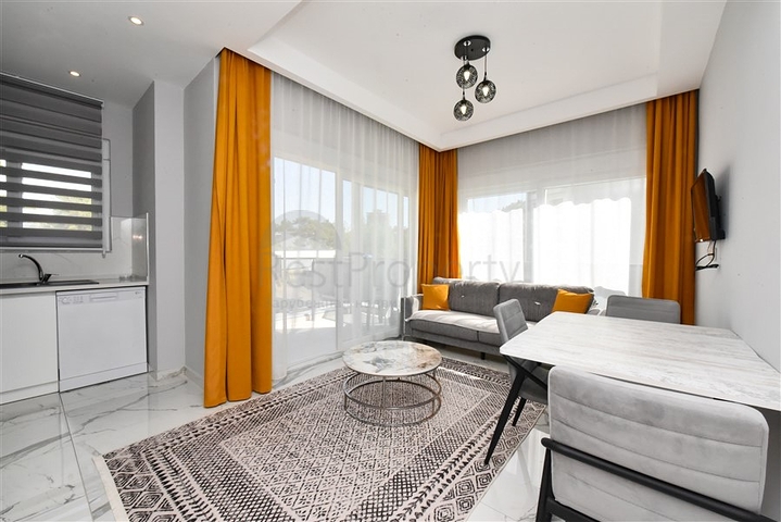 Меблированная квартира 1+1 в новом комплексе в Авсалларе