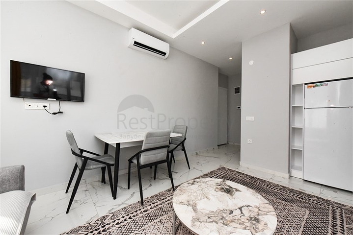 Меблированная квартира 1+1 в новом комплексе в Авсалларе