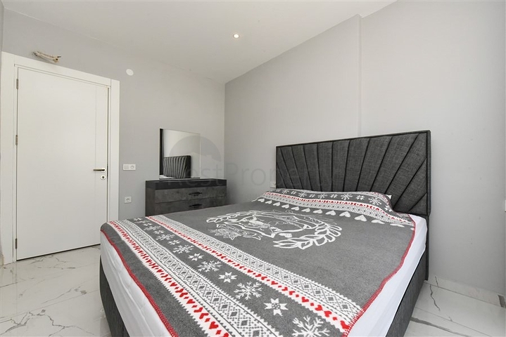 Меблированная квартира 1+1 в новом комплексе в Авсалларе