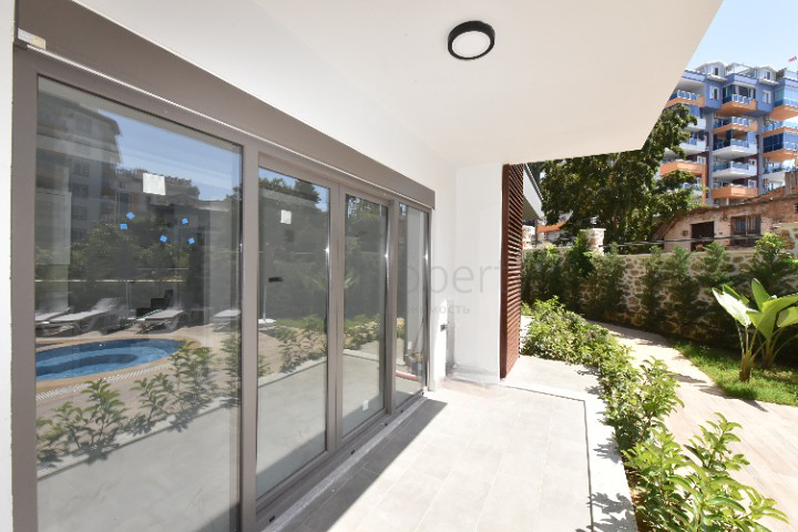 Садовый дуплекс планировкой 2+1 в районе Тосмур