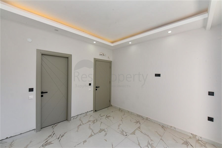 Садовый дуплекс планировкой 2+1 в районе Тосмур