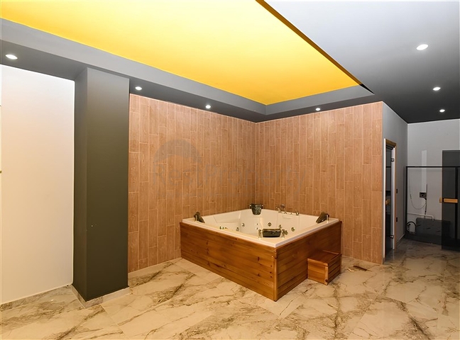 Садовый дуплекс планировкой 2+1 в районе Тосмур