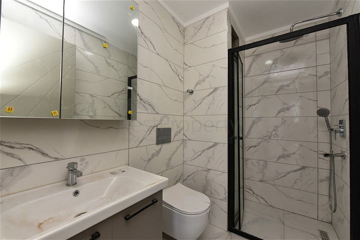 Садовый дуплекс планировкой 2+1 в районе Тосмур