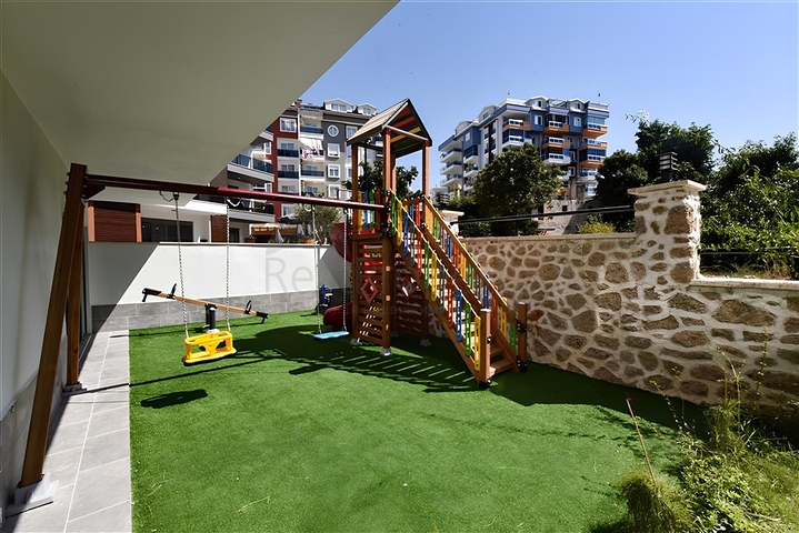 Садовый дуплекс планировкой 2+1 в районе Тосмур