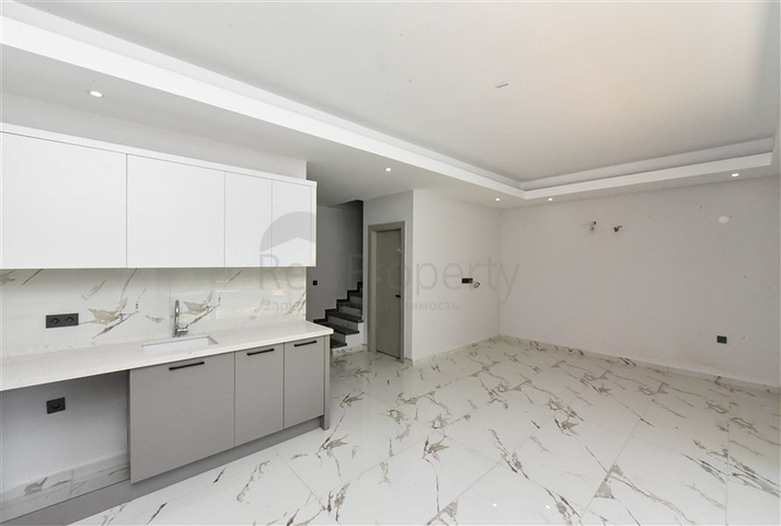 Садовый дуплекс планировкой 2+1 в районе Тосмур