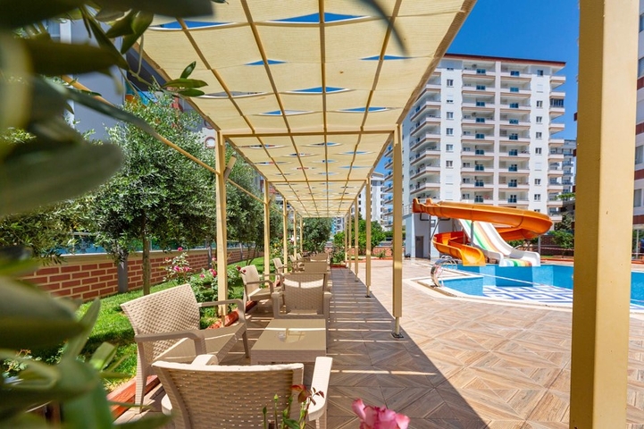 Меблированная квартира планировкой 1+1 в районе Махмутлар