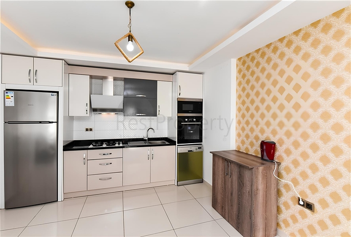 Меблированная квартира планировкой 1+1 в районе Махмутлар