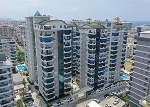 Меблированная квартира планировкой 1+1 в комплексе премиум класса в районе Махмутлар