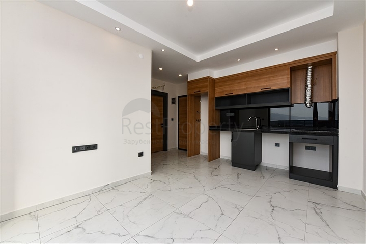 Квартира 1+1 в районе Махмутлар