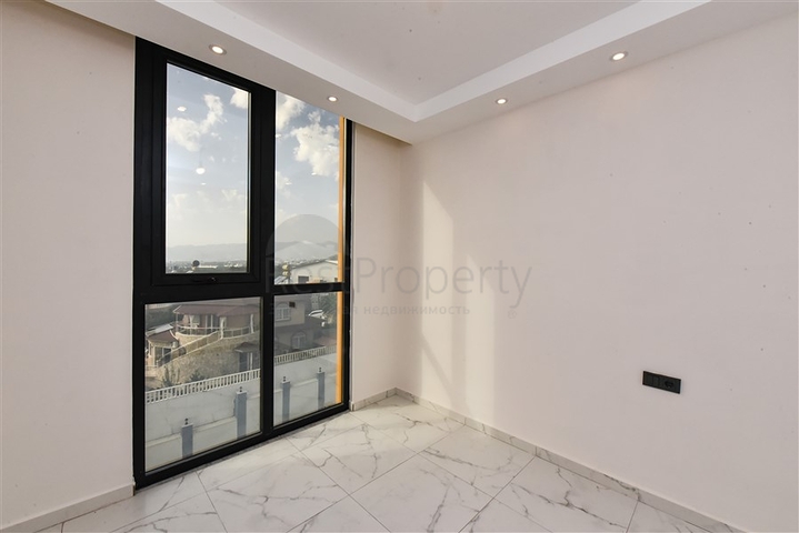 Квартира 1+1 в районе Махмутлар