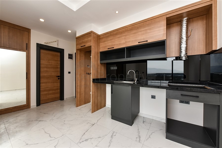 Квартира 1+1 в районе Махмутлар