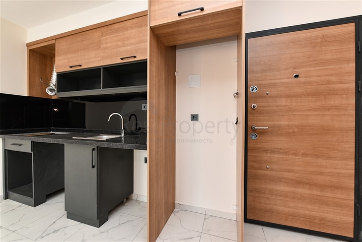 Квартира 1+1 в новом жилом комплексе в районе Махмутлар