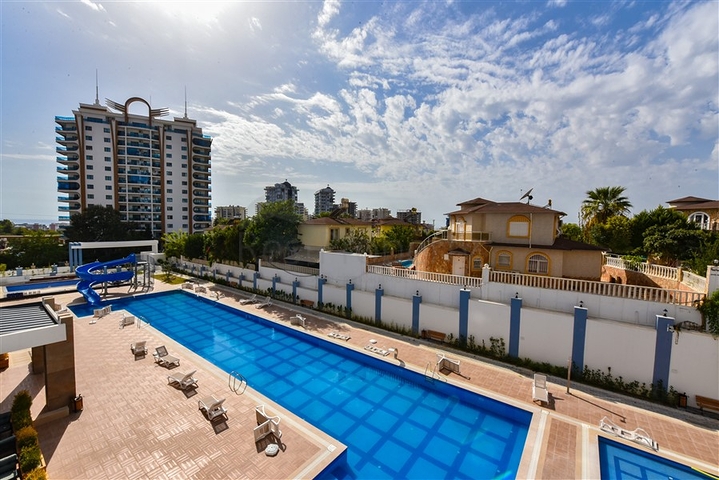 Квартира 1+1 в новом жилом комплексе в районе Махмутлар