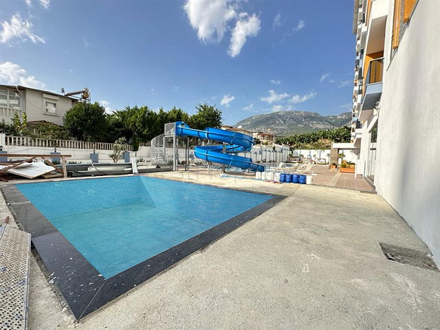 Квартира 1+1 в новом жилом комплексе в районе Махмутлар