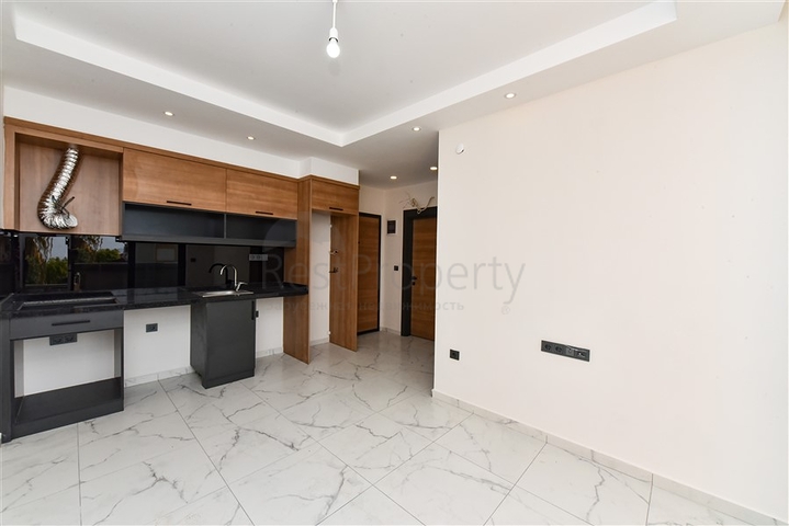 Квартира 1+1 в новом жилом комплексе в районе Махмутлар